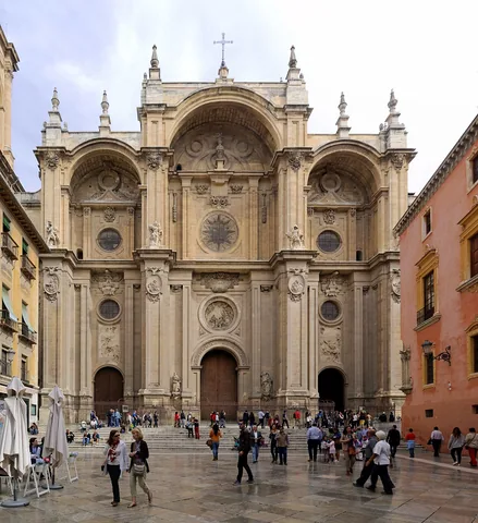 Granada Cathedral’s triple-arched main facade, seen from the Plaza de las Pasiegas.