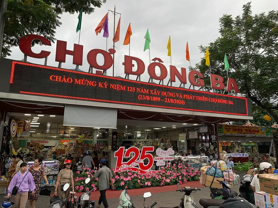 The signed entrance and stalls of Đông Ba Market in Huế