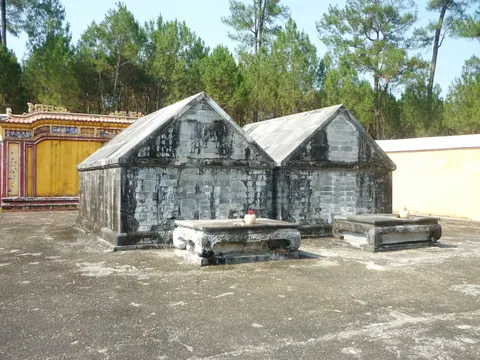 Paired stone tombs within the Gia Long mausoleum complex