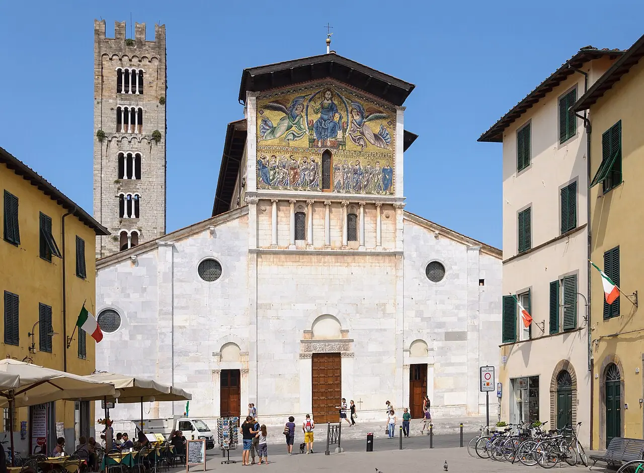 Facade mosaic of the Ascension above the entrances of San Frediano, with the bell tower behind
