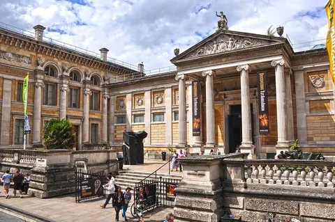 The Ashmolean Museum’s columned entrance and forecourt on Beaumont Street, Oxford