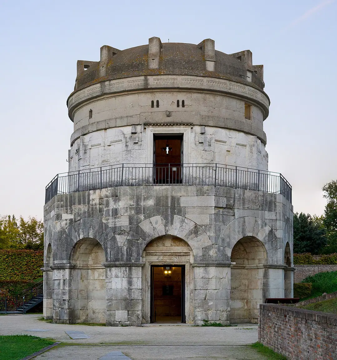Two pale stone levels of the Mausoleum of Theodoric beneath its single-stone roof