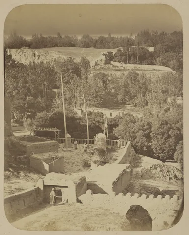 Historic photograph from 1865–1872 of the shrine of Daniel beneath the slopes of Afrasiab, before the present mausoleum.