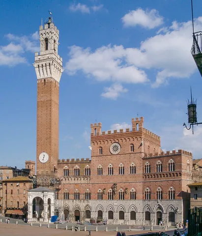 Brick Palazzo Pubblico and Torre del Mangia facing Piazza del Campo in Siena