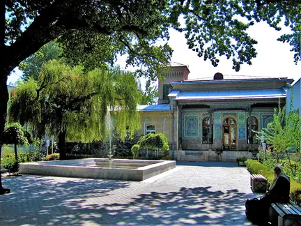 A planted courtyard and decorated exterior at Tashkent’s Museum of Applied Arts.